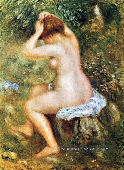 baigneuse se coiffant Pierre Auguste Renoir Peintures à l'huile